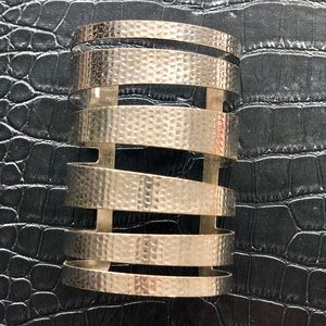 Silver tone arm cuff